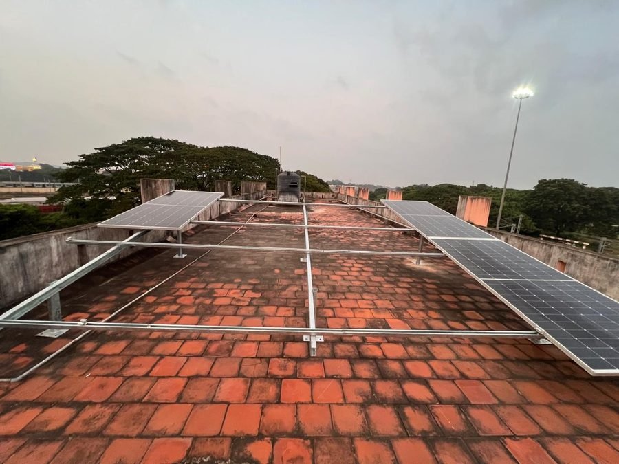 Split rooftop solar array installed by Shakthi Solar across a tiled terrace in the Mumbai region